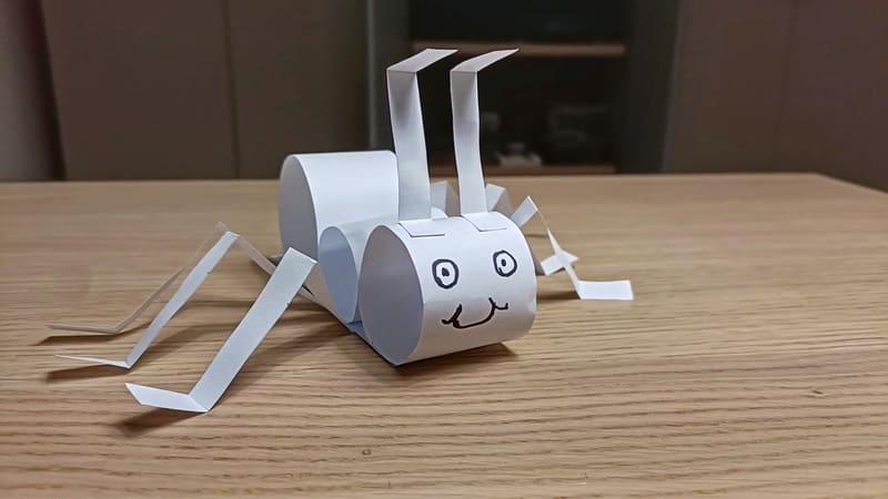 Origami de formiga de papel
